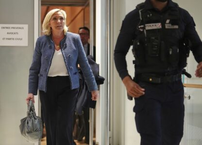 French far-right leader Marine Le Pen leaves the courtroom after a French court found Marine Le Pen guilty on in an embezzlement case but didn't immediately say what her sentence might be and how it might impact the far-right leader's political future, Monday, March 31, 2025 in Paris. (AP Photo/Thibault Camus)
