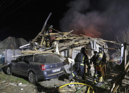 FILE - Rescuers work on site of a residential building destroyed by a Russian drone strike in Zaporizhzhia, Ukraine, March 21, 2025. (AP Photo/Kateryna Klochko, File)
