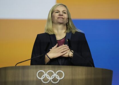 FILE - Kirsty Coventry reacts after she was announced as the new IOC President at the International Olympic Committee 144th session in Costa Navarino, western Greece, March 20, 2025. (AP Photo/Thanassis Stavrakis, File)