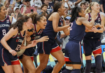UConn players react late in the second half of the national championship game against South Carolina at the Final Four of the women's NCAA college basketball tournament, Sunday, April 6, 2025, in Tampa, Fla. (AP Photo/John Raoux)