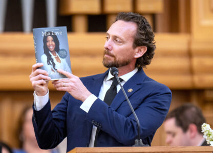 Husband Jason Love speaks at funeral services for former U.S. Rep. Mia Love at the University of Utah Institute of Religion in Salt Lake City on Monday, April 7, 2025. (Rick Egan/The Salt Lake Tribune via AP, Pool)