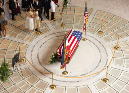 Attendees pay their respects during a funeral service for former U.S. Rep. Mia Love, Sunday, April 6, 2025, in Salt Lake City. (AP Photo/Melissa Majchrzak)