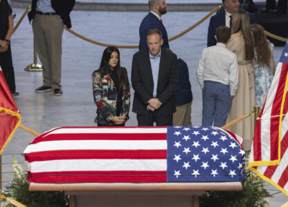 Attendees pay their respects during a funeral service for former U.S. Rep. Mia Love, Sunday, April 6, 2025, in Salt Lake City. (AP Photo/Melissa Majchrzak)