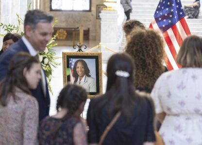 Attendees pay their respects during a funeral service for former U.S. Rep. Mia Love, Sunday, April 6, 2025, in Salt Lake City. (AP Photo/Melissa Majchrzak)