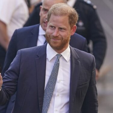 Prince Harry gestures as he arrives at the High Court in London, England, Tuesday, April 8, 2025. (AP Photo/Alberto Pezzali)
