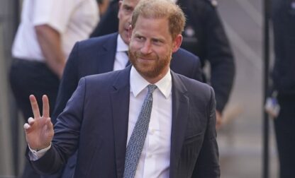 Prince Harry gestures as he arrives at the High Court in London, England, Tuesday, April 8, 2025. (AP Photo/Alberto Pezzali)