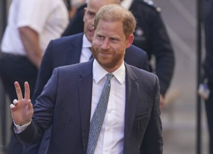 Prince Harry gestures as he arrives at the High Court in London, England, Tuesday, April 8, 2025. (AP Photo/Alberto Pezzali)