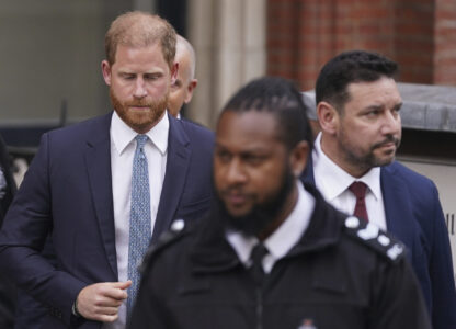 Britain's Prince Harry looks down as he leaves the Royal Courts of Justice in London, Tuesday, April 8, 2025. (AP Photo/Alberto Pezzali)