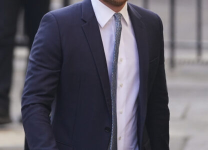 Britain's Prince Harry arrives at the High Court in London, England, Tuesday, April 8, 2025. (AP Photo/Alberto Pezzali)