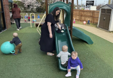 FILE - Delaney Griffin, center, plays with toddlers at the child care center where she works, March 13, 2024, in Lexington, Ky. (AP Photo/Dylan Lovan, File)