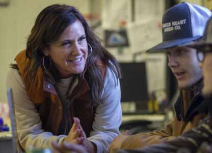 This image provided by Idaho Education News shows Brittany Ohman, an advisor for the Hope Squad, talking with Cutter Wasylow and another student during a Hope Squad class at Rigby High School in Rigby, Idaho on Wednesday, Feb. 5, 2025. (John Roark/Idaho Education News via AP)