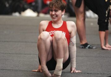 Ten Harder, of Boston University Gymnastics Club in Boston, warms up before to competing on the balance beam at the 2025 NAIGC national competition in Pittsburgh, Friday, April 4, 2025. (AP Photo/Gene J. Puskar)