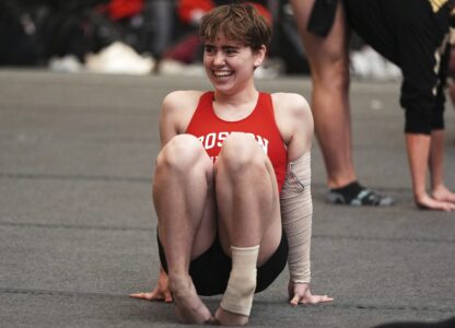 Ten Harder, of Boston University Gymnastics Club in Boston, warms up before to competing on the balance beam at the 2025 NAIGC national competition in Pittsburgh, Friday, April 4, 2025. (AP Photo/Gene J. Puskar)