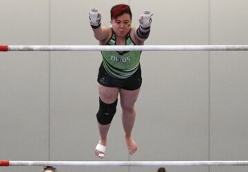 Raiden Hung, of Jurassic Gymnastics in Boston, competes on the uneven bars at the 2025 NAIGC national competition in Pittsburgh, Friday, April 4, 2025. (AP Photo/Gene J. Puskar)