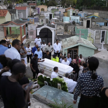 Family and friends attend the funeral of Marilenny Pilarte who died at the Jet Set nightclub when its roof collapsed, in Haina, Dominican Republic, Thursday, April 10, 2025. (AP Photo/Matias Delacroix)