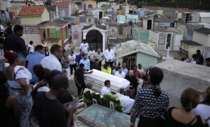 Family and friends attend the funeral of Marilenny Pilarte who died at the Jet Set nightclub when its roof collapsed, in Haina, Dominican Republic, Thursday, April 10, 2025. (AP Photo/Matias Delacroix)
