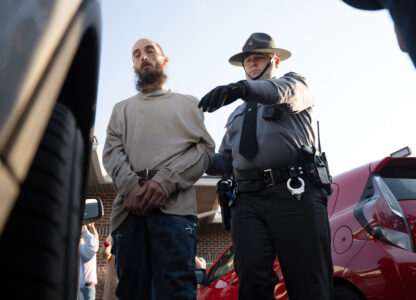 Cody Balmer is escorted from court after his preliminary arraignment on Monday, April 14, 2025, in Harrisburg, Pa. (AP Photo/Mingson Lau)