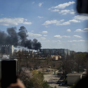 Smoke rises from an explosion following a Russian drone strike on Sumy, Ukraine, Monday, April 14, 2025. (AP Photo/Evgeniy Maloletka)
