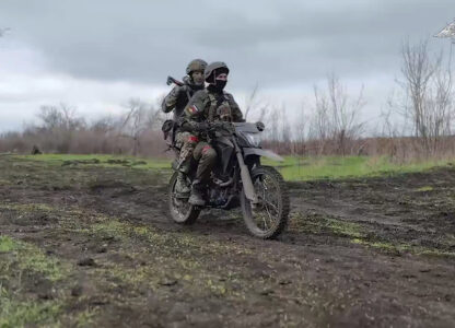 In this photo taken from video distributed by Russian Defense Ministry Press Service on Monday, April 14, 2025, Russian servicemen attend a combat training for assault units in an undisclosed location. (Russian Defense Ministry Press Service via AP)