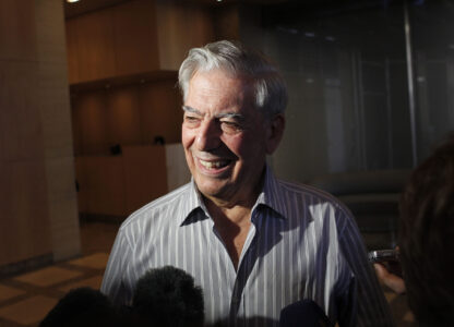 FILE - Writer Mario Vargas Llosa speaks to reporters in New York, Oct. 7, 2010. (AP Photo/Seth Wenig, File)