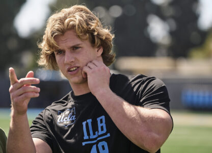 FILE - UCLA linebacker Carson Schwesinger attends the team's NCAA college football pro day in Los Angeles, on March 17, 2025. (AP Photo/Damian Dovarganes, File)