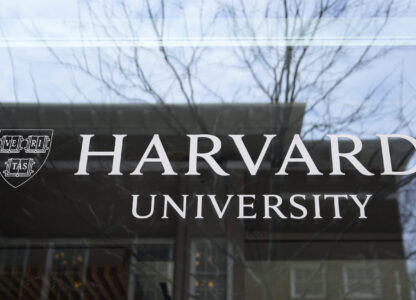 The Harvard University logo is displayed on a building at the school, Tuesday, April 15, 2025, in Cambridge, Mass. (AP Photo/Charles Krupa)