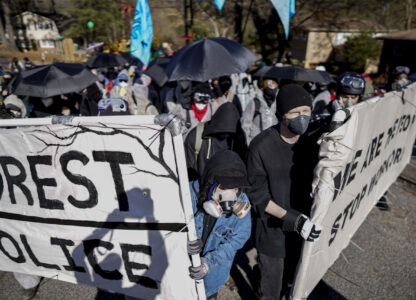 FILE - Protesters march during a demonstration in opposition to a new police training center on Nov. 13, 2023, in Atlanta. (AP Photo/Mike Stewart, File)