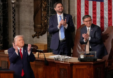 FILE - President Donald Trump, Vice President JD Vance and House Speaker Mike Johnson applaud during the State of the Union address in the House chamber at the U.S. Capitol in Washington, Feb. 24, 2026. (AP Photo/Mark Schiefelbein, File)