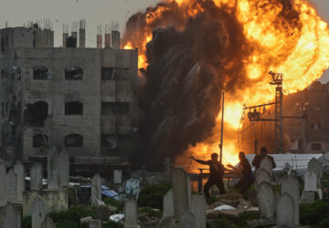 FILE - Smoke and flames rise from an Israeli military strike on a building in the Zeitoun neighborhood of Gaza City, Feb. 6, 2026. (AP Photo/Jehad Alshrafi, File)