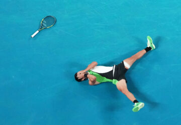 FILE - Carlos Alcaraz of Spain reacts after winning the men's singles final match against Novak Djokovic of Serbia at the Australian Open tennis championship in Melbourne, Australia, Feb. 1, 2026. (AP Photo/Dar Yasin, File)