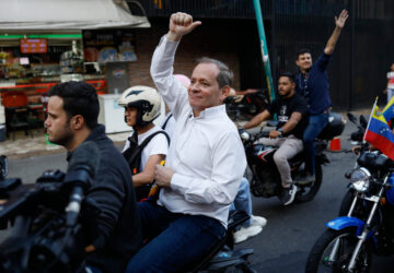 FILE - Opposition leader Juan Pablo Guanipa rides on the back of a motorcycle after his release from prison in Caracas, Venezuela, Feb. 8, 2026.(AP Photo/Cristian Hernandez, File)