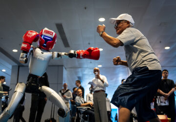 APTOPIX Hong Kong Robots