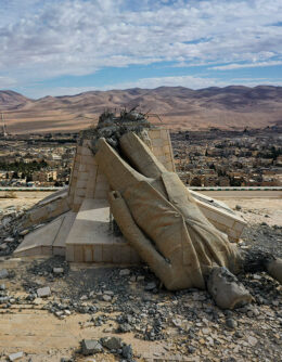 A statue of the late Syrian President Hafez Assad, which was toppled and defaced during the uprising that overthrew the Assad regime last December, lies in ruins atop a mountain in Dayr Atiyah, Syria, Jan. 5, 2025. (AP Photo / Ghaith Alsayed)