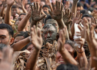 APTOPIX Philippines Mud Festival Photo Gallery